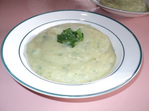 steaming hot potato soup with parsley